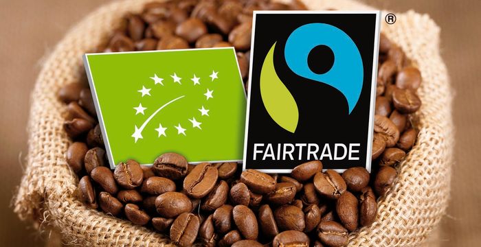 Kaffeebohnen mit EU-Bio-Siegel und TransFair-Siegel